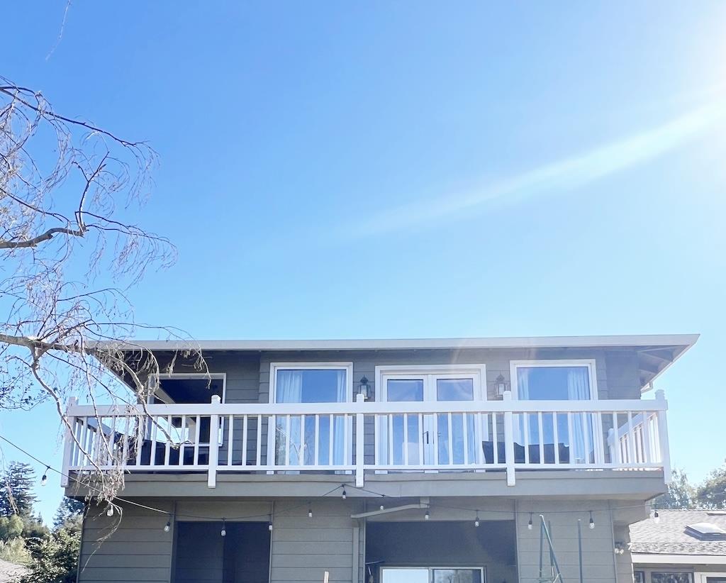 a view of house with roof deck