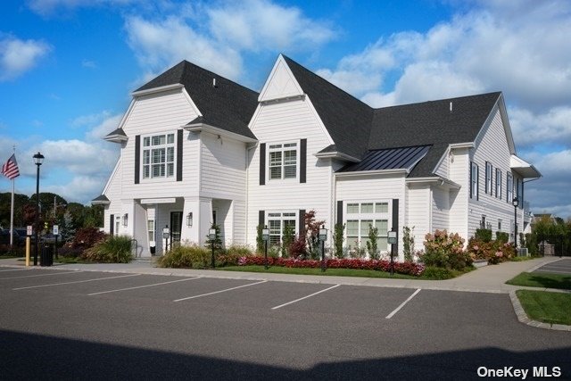 a front view of a large white building