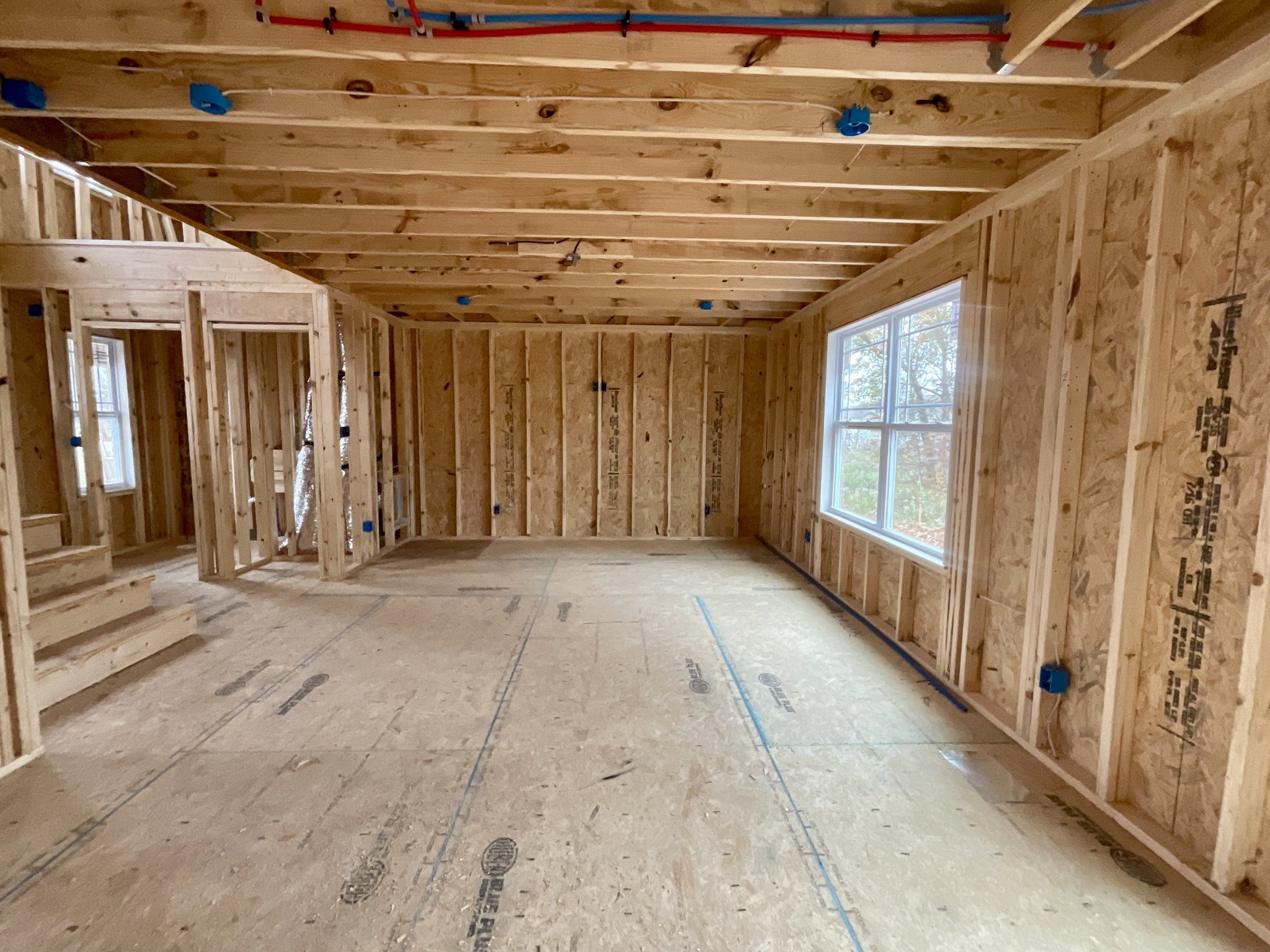 a view of a room with wooden walls