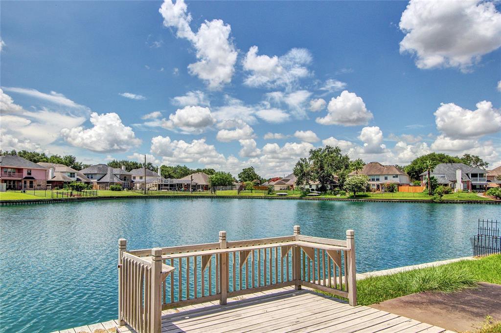 a view of a lake with a deck