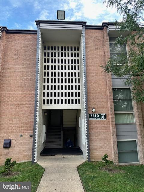 a front view of a house with a balcony