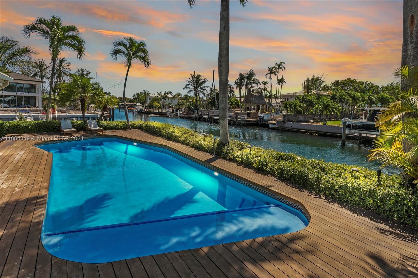 a view of a swimming pool with a lake view