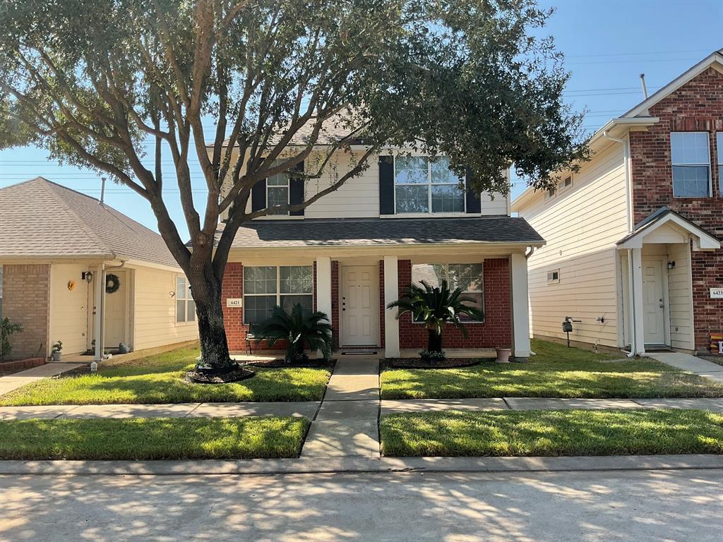 a front view of house with yard