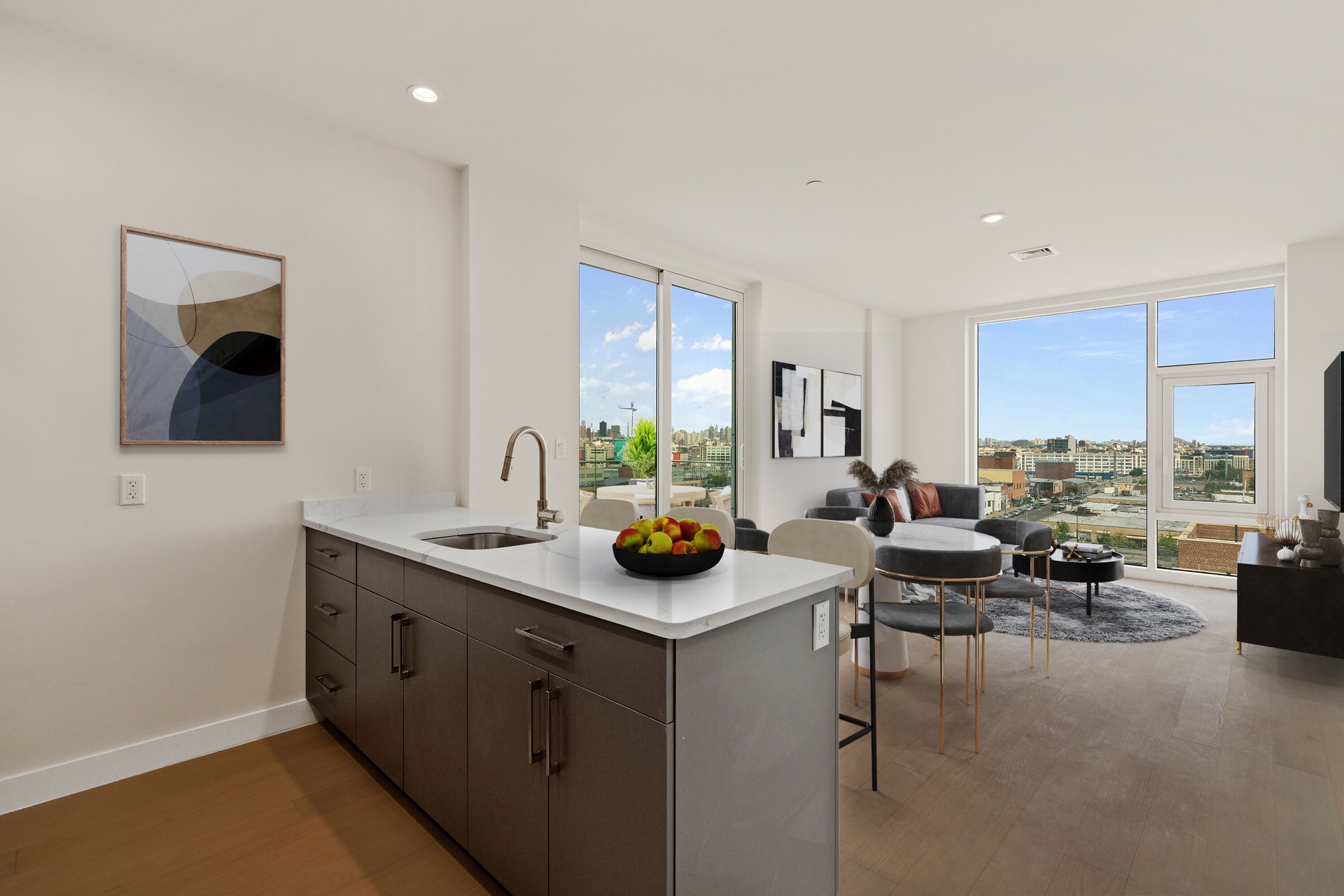 a view of a living room and kitchen