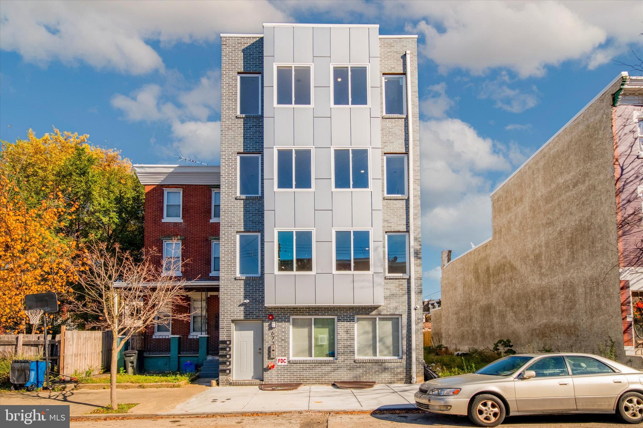 a front view of a building with street view