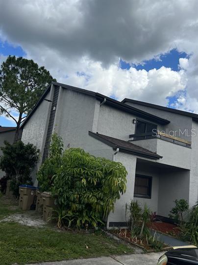 a top view of a house with a yard