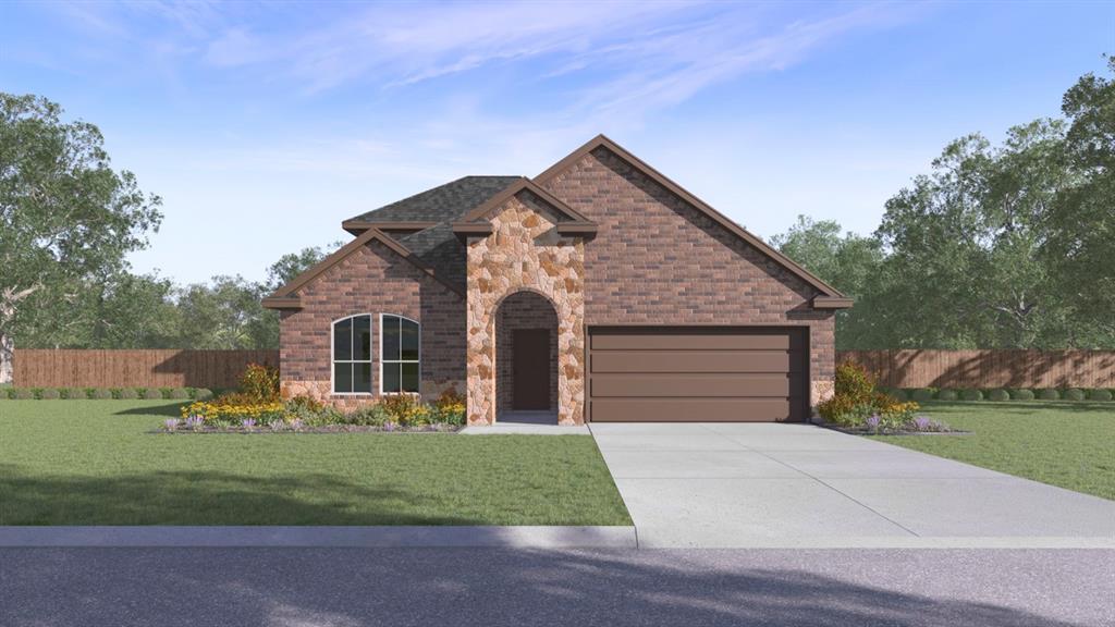 a front view of house with garage and yard