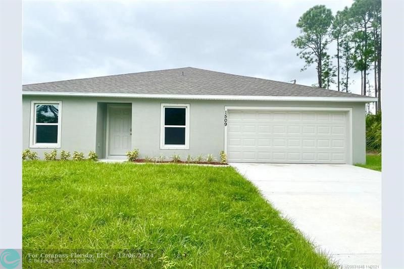 front view of house with a yard