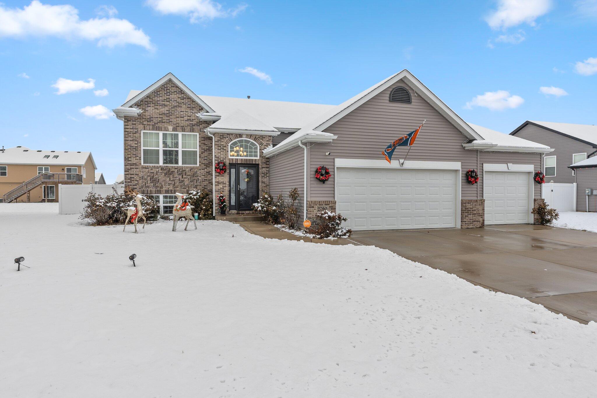 a view of garage and yard