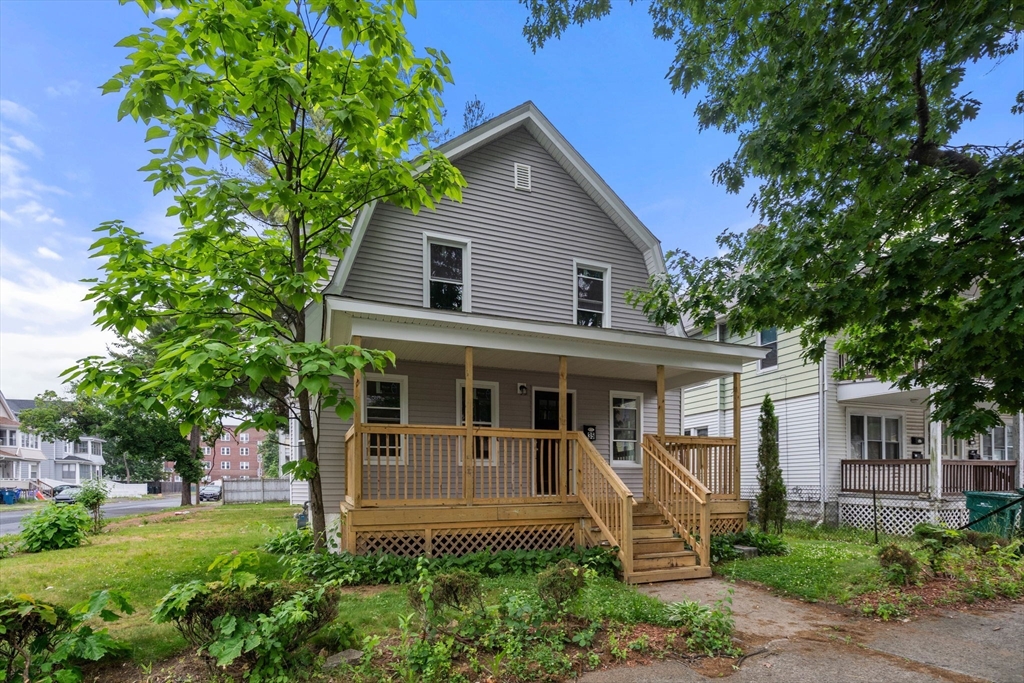 front view of a house with a yard