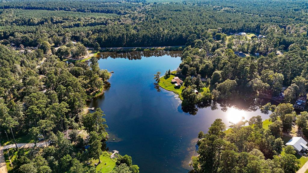 a view of a lake with a house