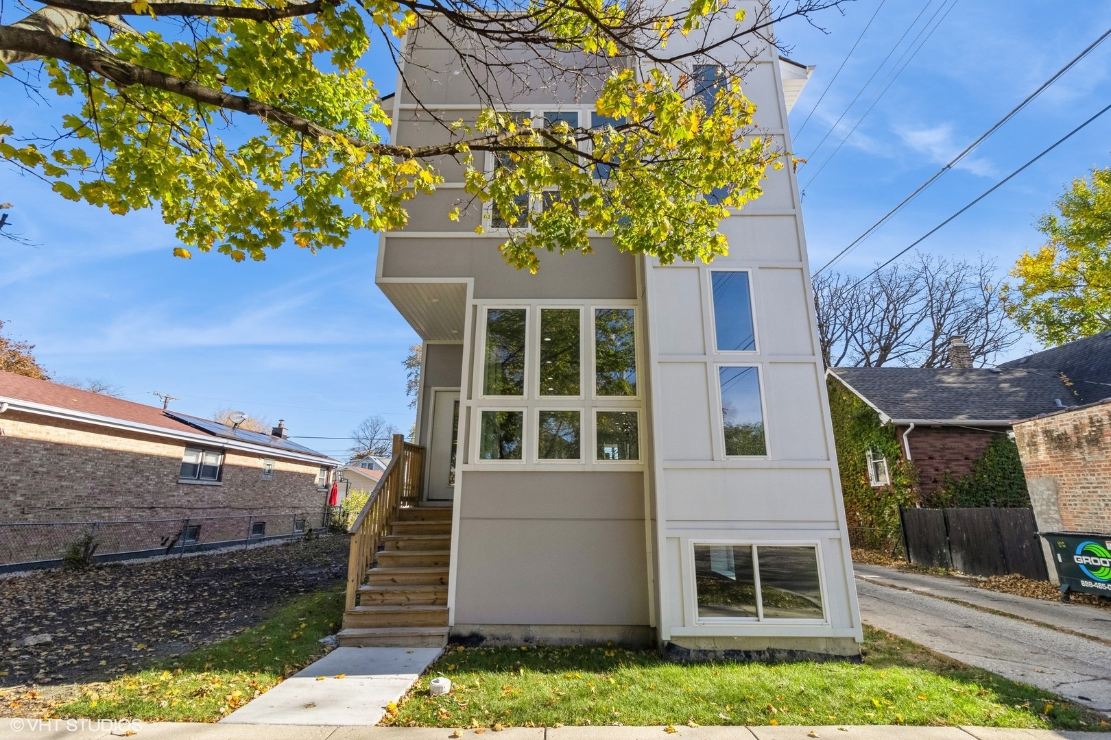 a front view of a house with a yard