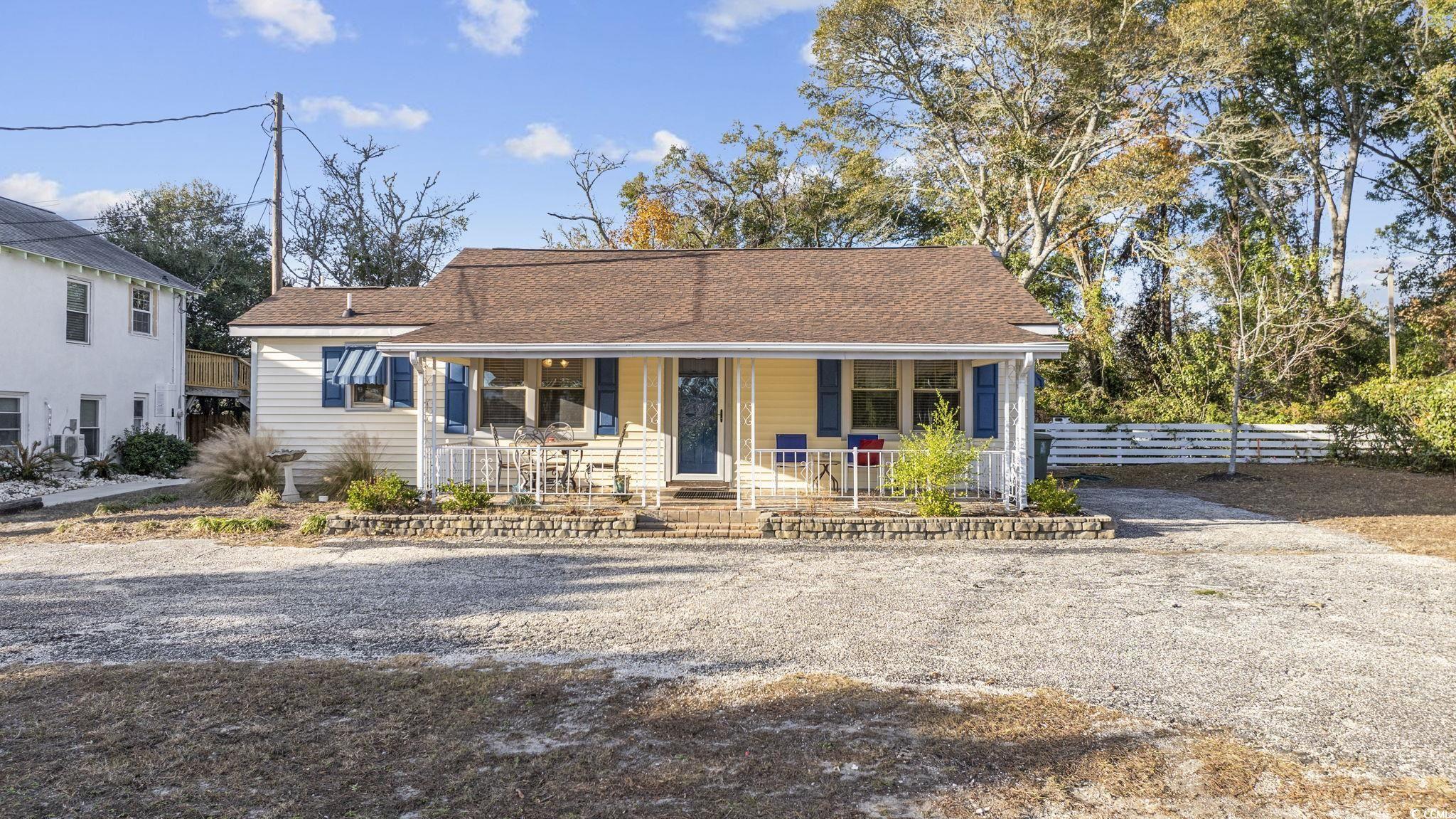 View of front of property with a porch