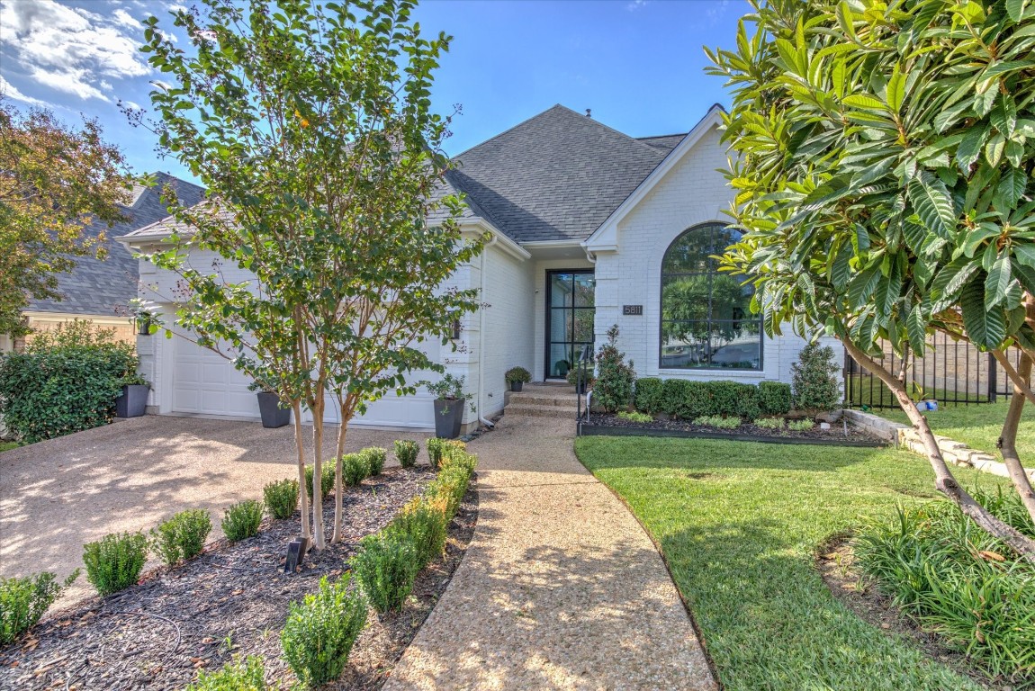 5811 Kentucky Derby is on a quiet cul-de-sac within the highly coveted Davenport Ranch community in Eanes ISD. Custom iron front door and window, new landscaping and fresh coat of paint were added to the all-brick exterior.