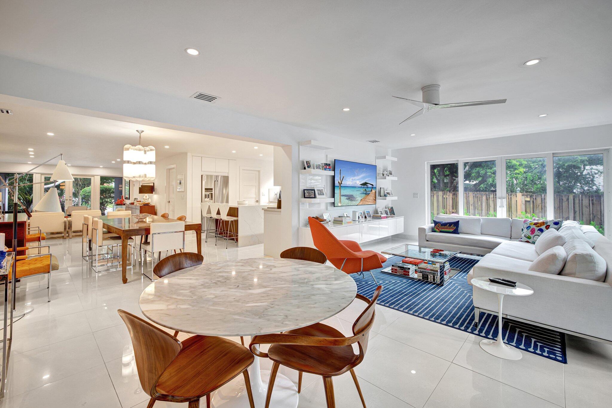 a living room with furniture and a table