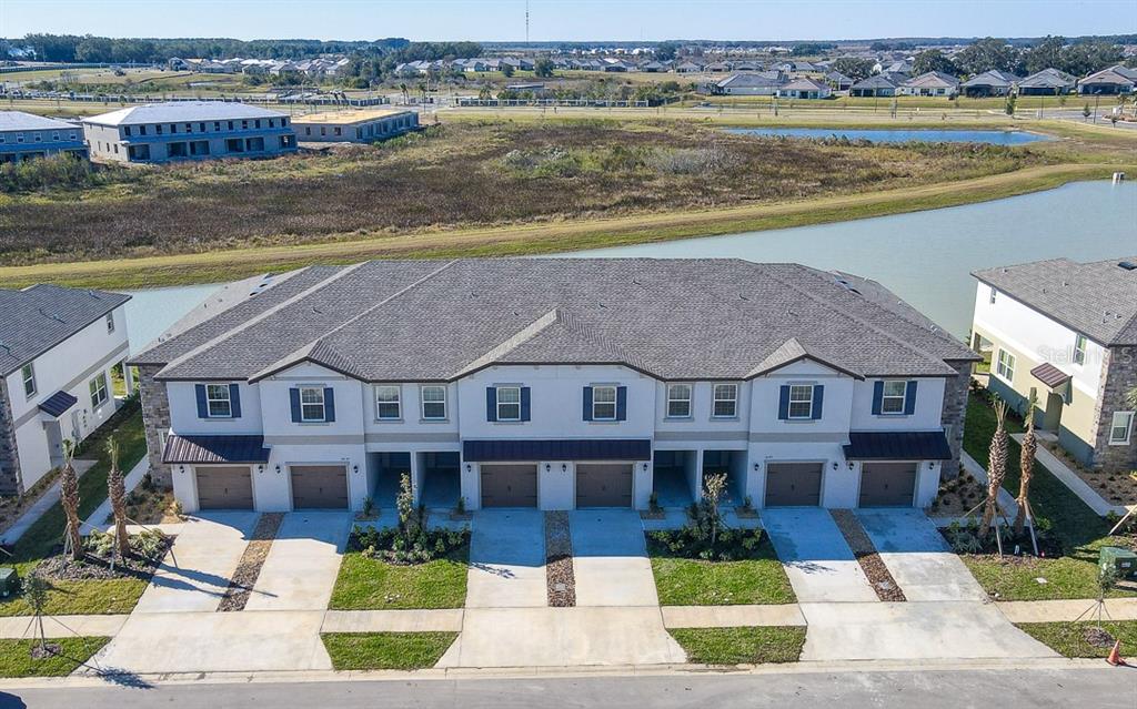 a aerial view of a house with a ocean view