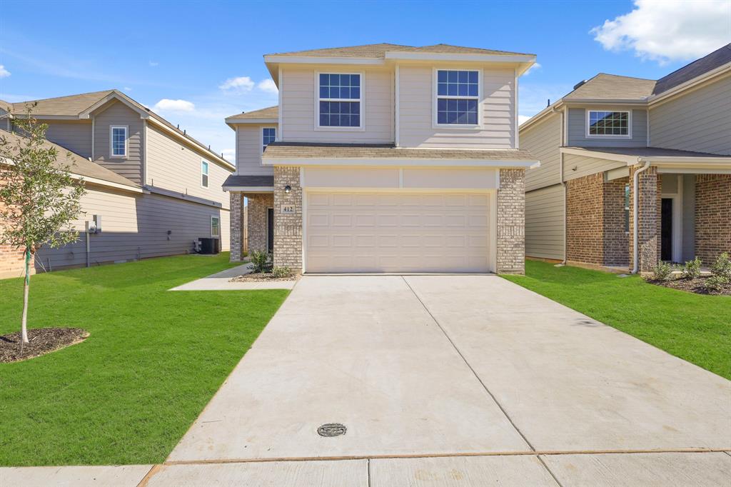 a front view of house with yard