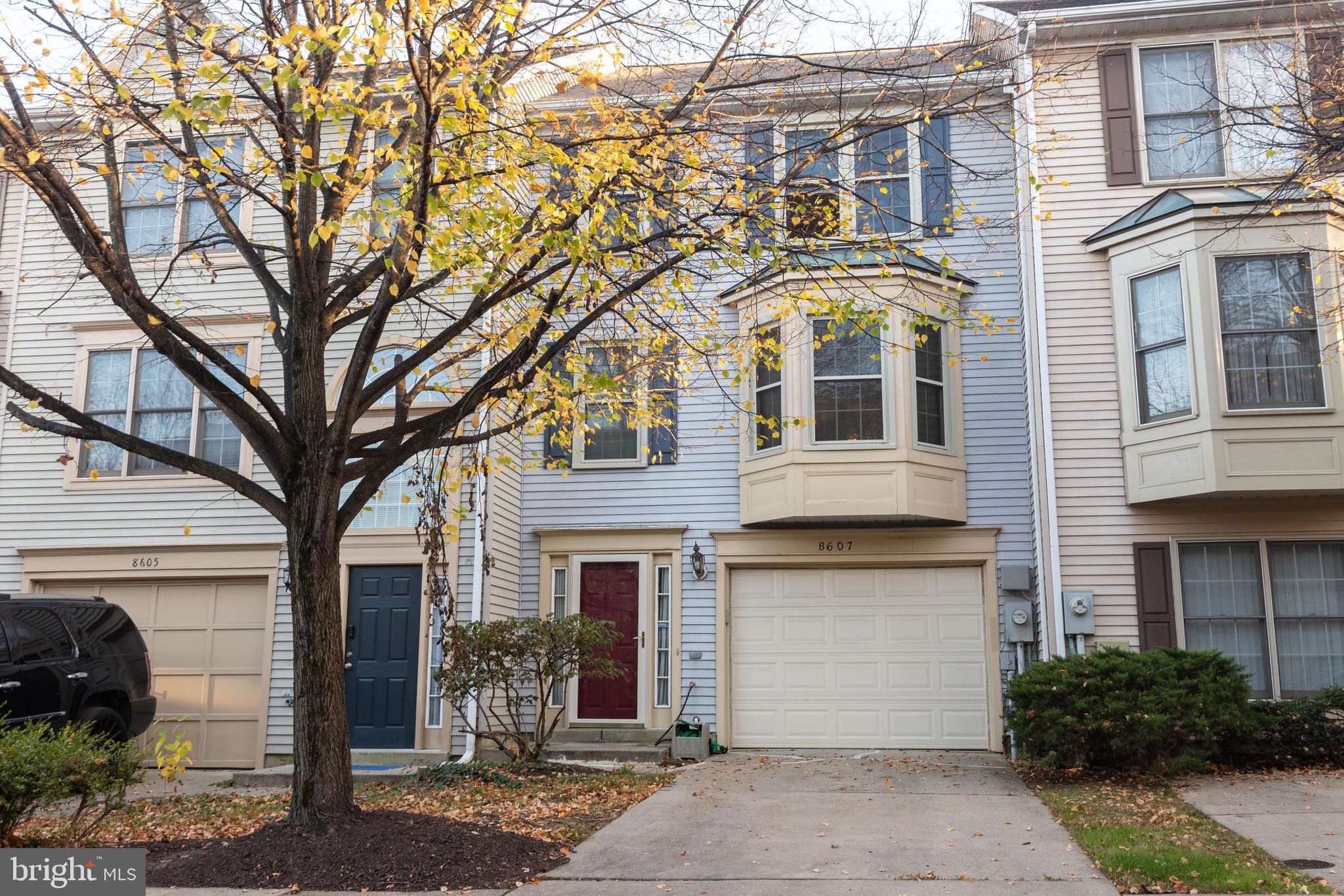 a front view of a house with yard