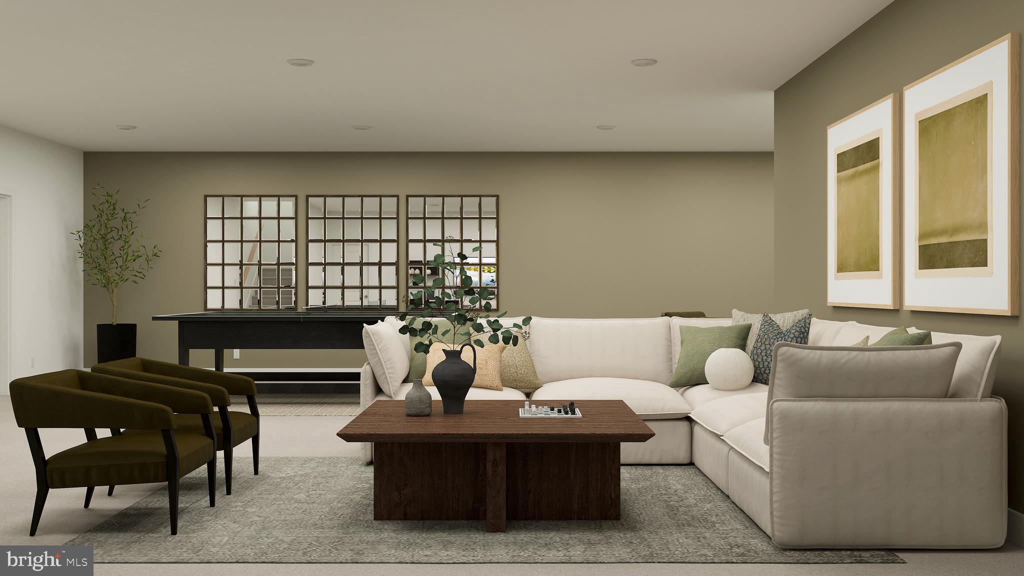 a living room with furniture and a potted plant