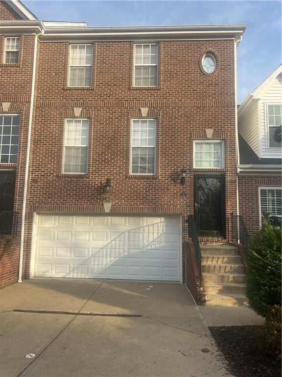 a front view of a house having yard