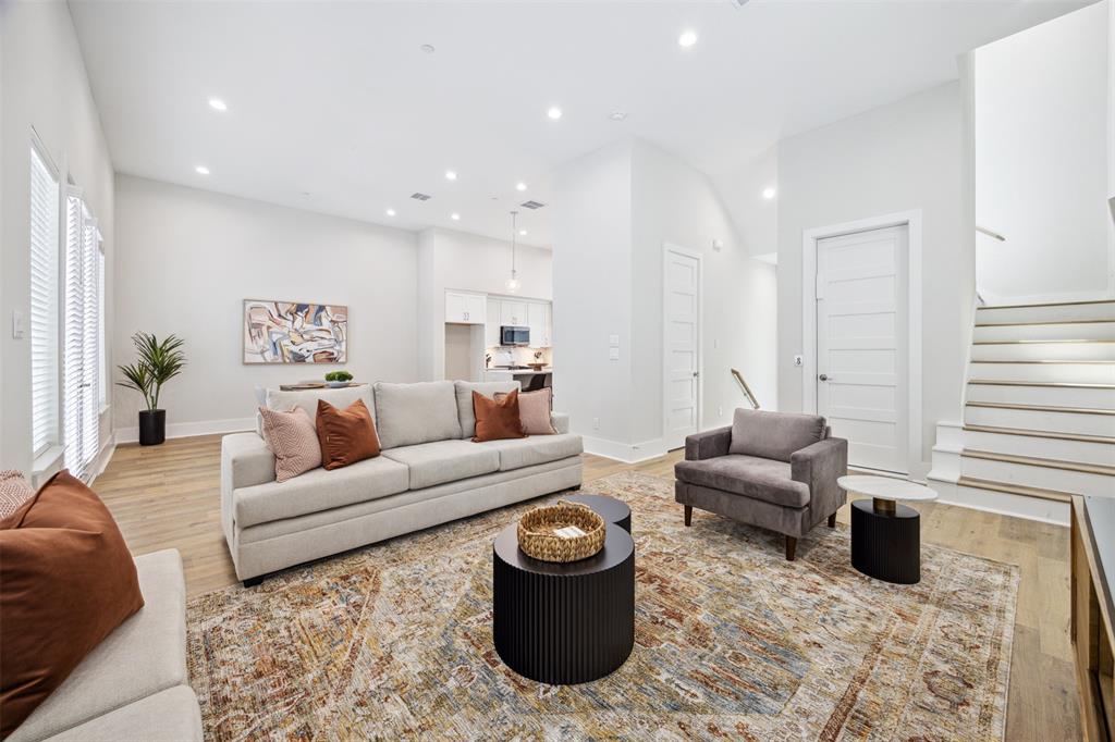 a living room with furniture and a couch