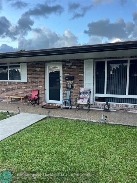 a front view of house with yard