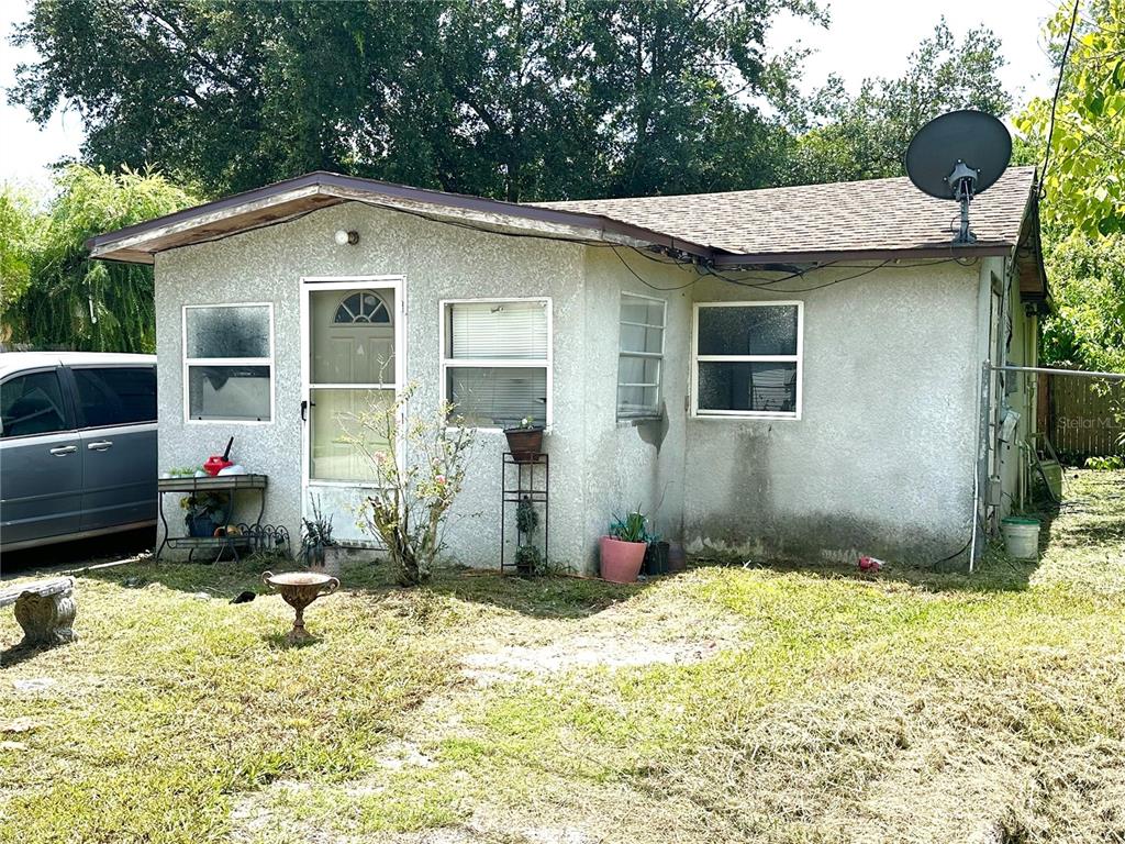 a front view of a house with yard