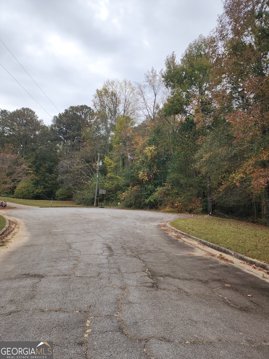 a view of a road with a yard