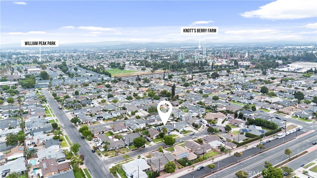 an aerial view of residential building with parking space