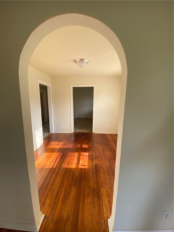 a view of swimming pool from a hallway