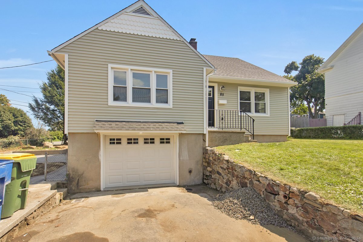 a front view of house with yard