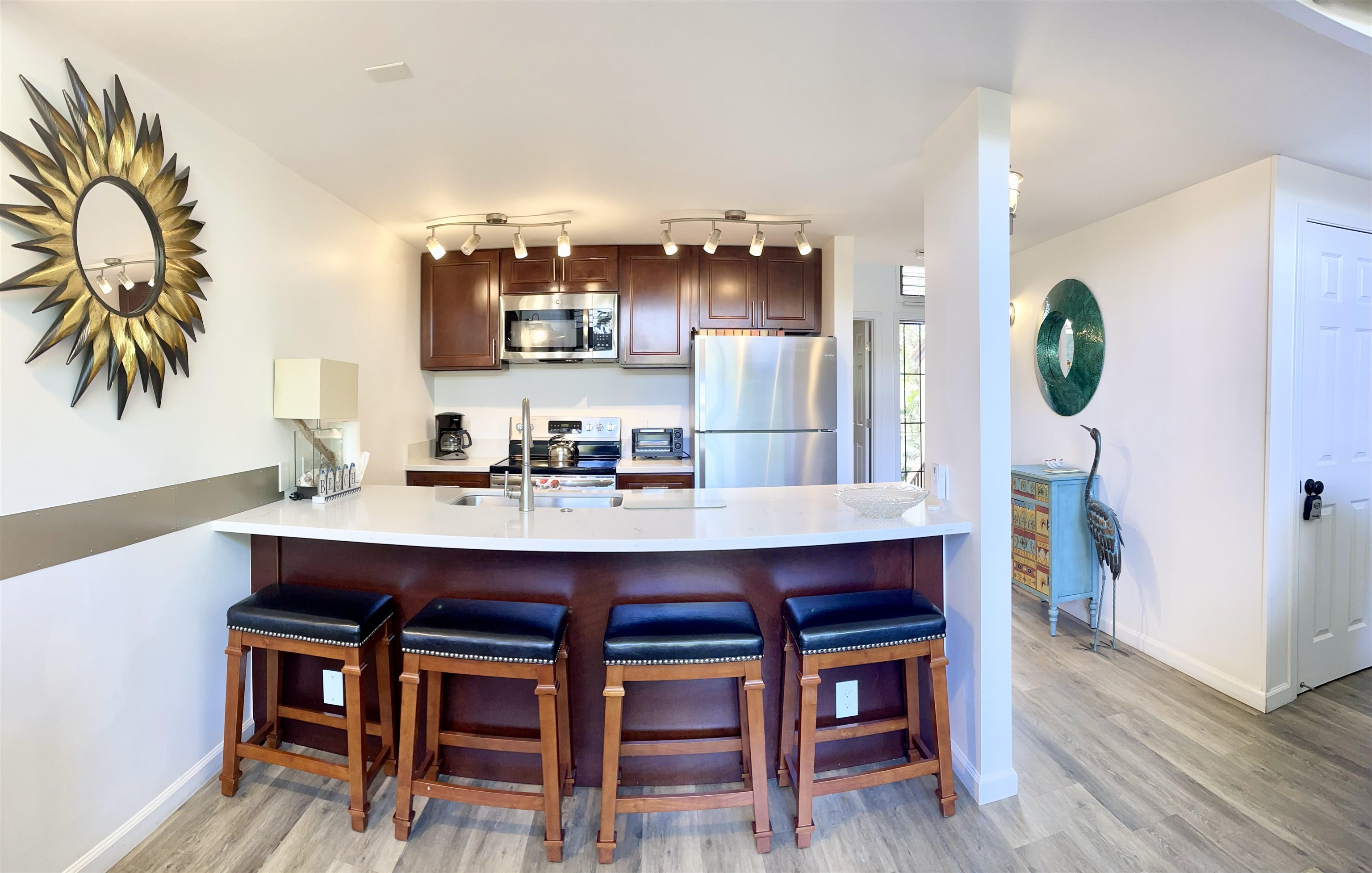 a dining hall with a dining table and chairs with wooden floor