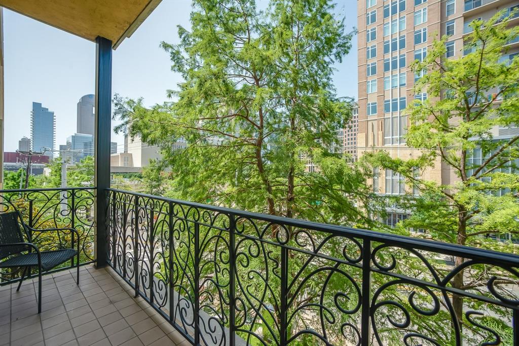 a view of a balcony with an outdoor space