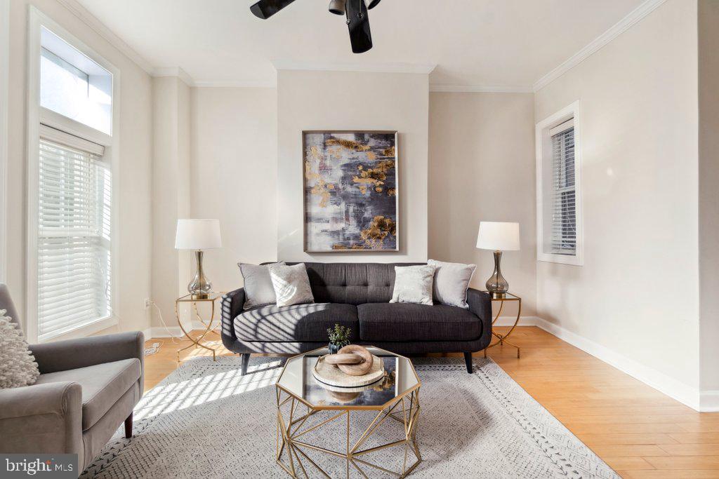 a living room with furniture and a window