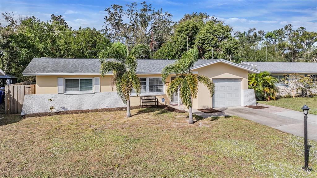 a house with trees in the background