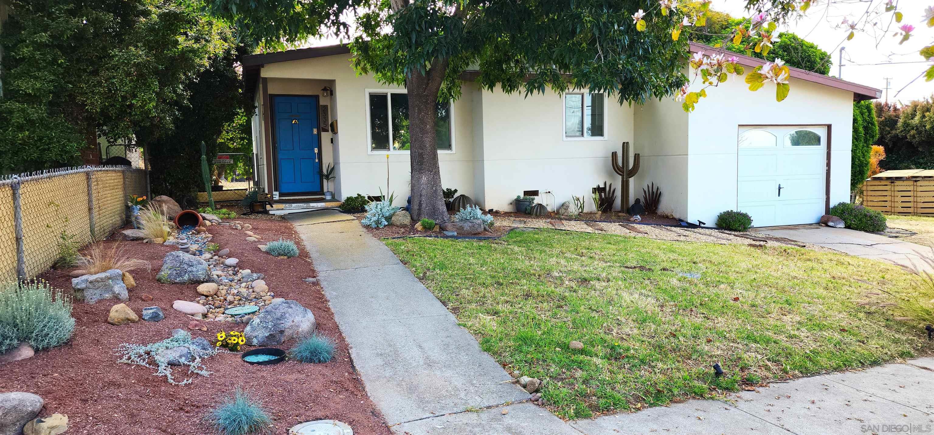 a front view of house with yard