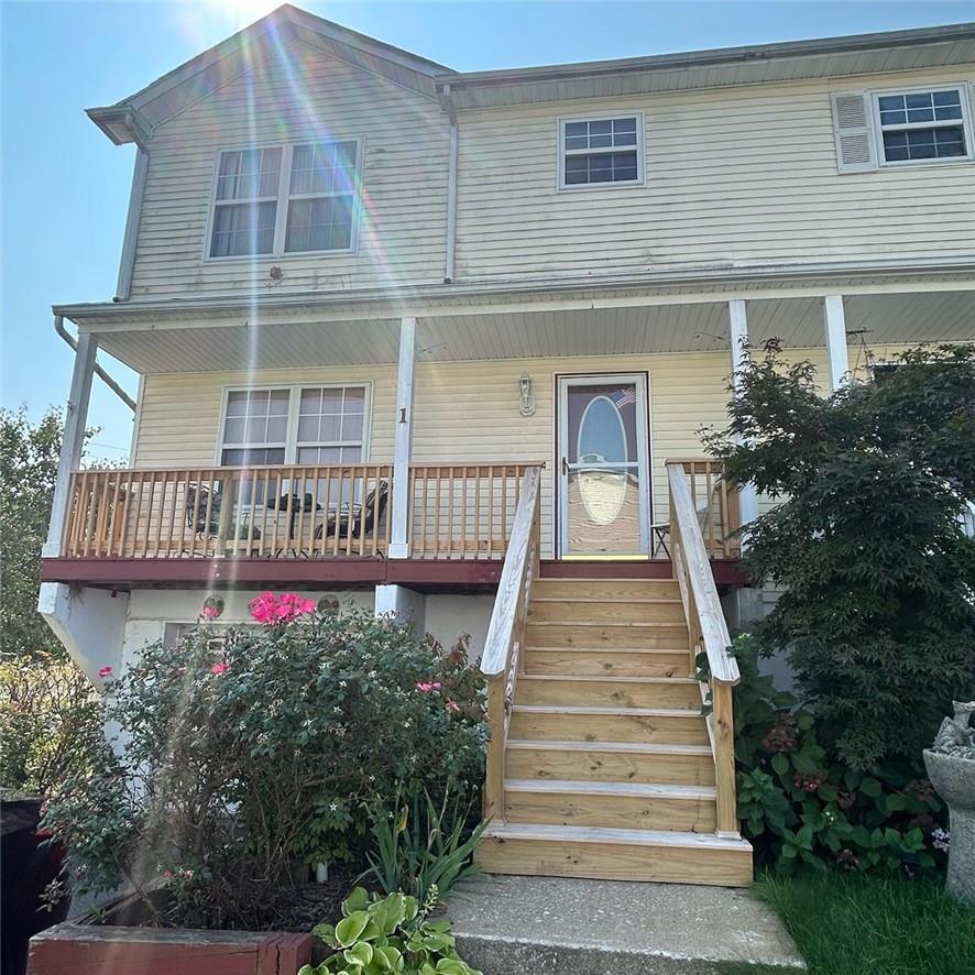 View of front of home featuring covered porch