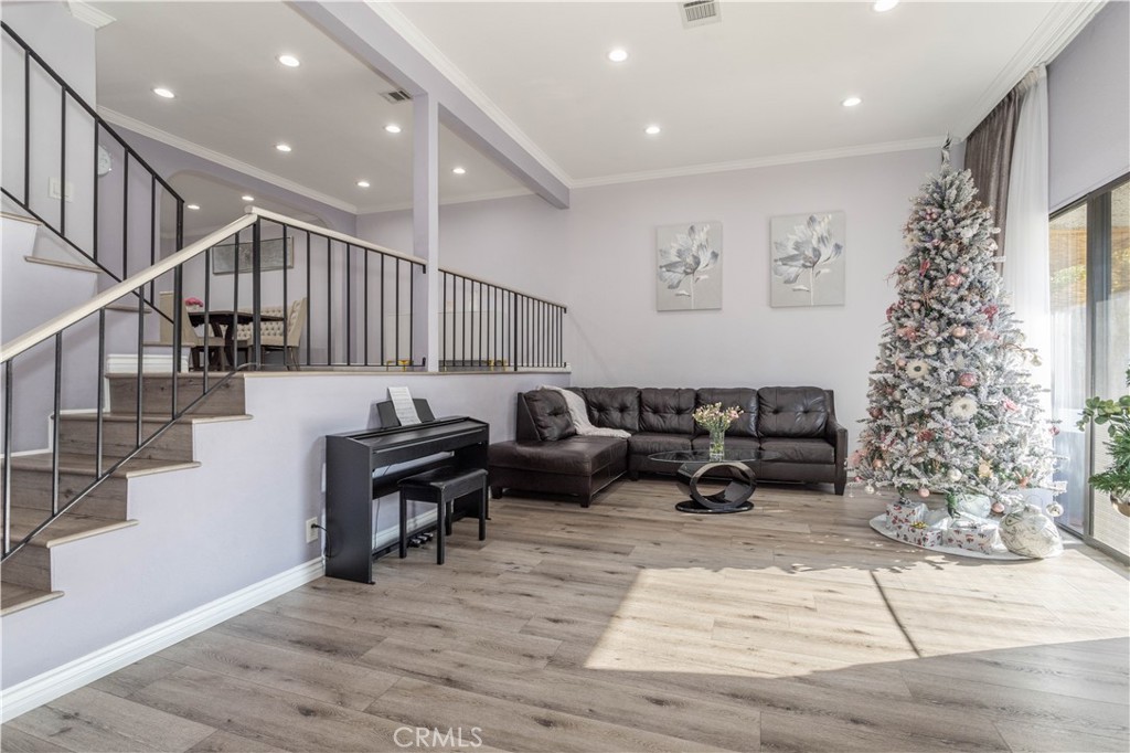 a living room with furniture and a table