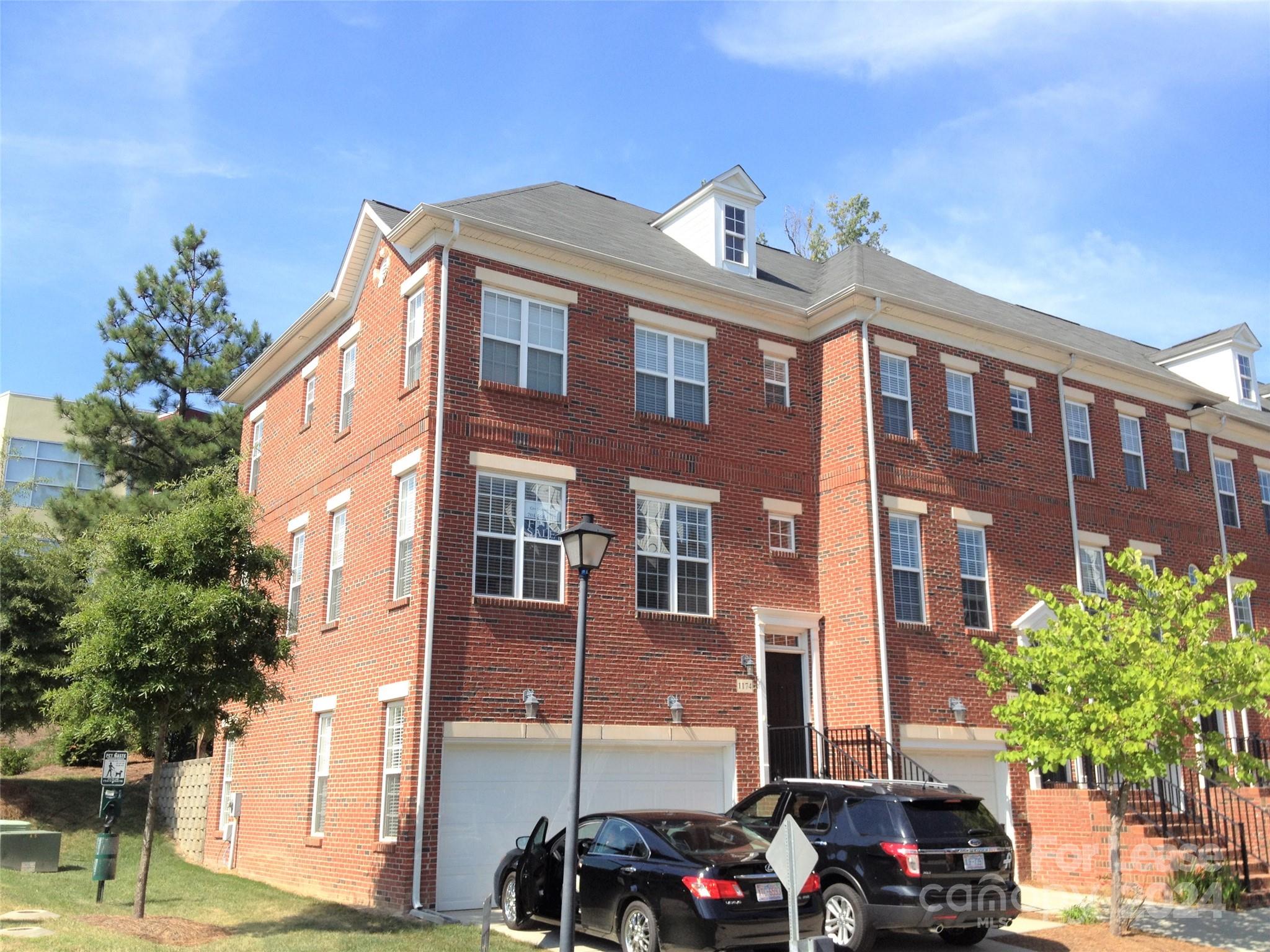 a front view of a building with street view