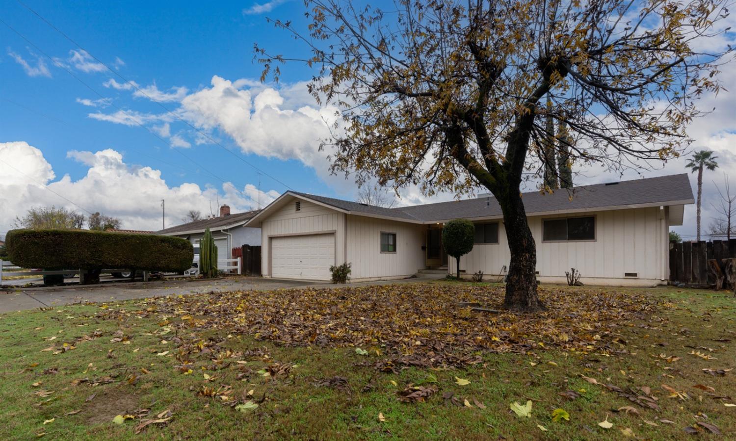 a house with trees in front of it