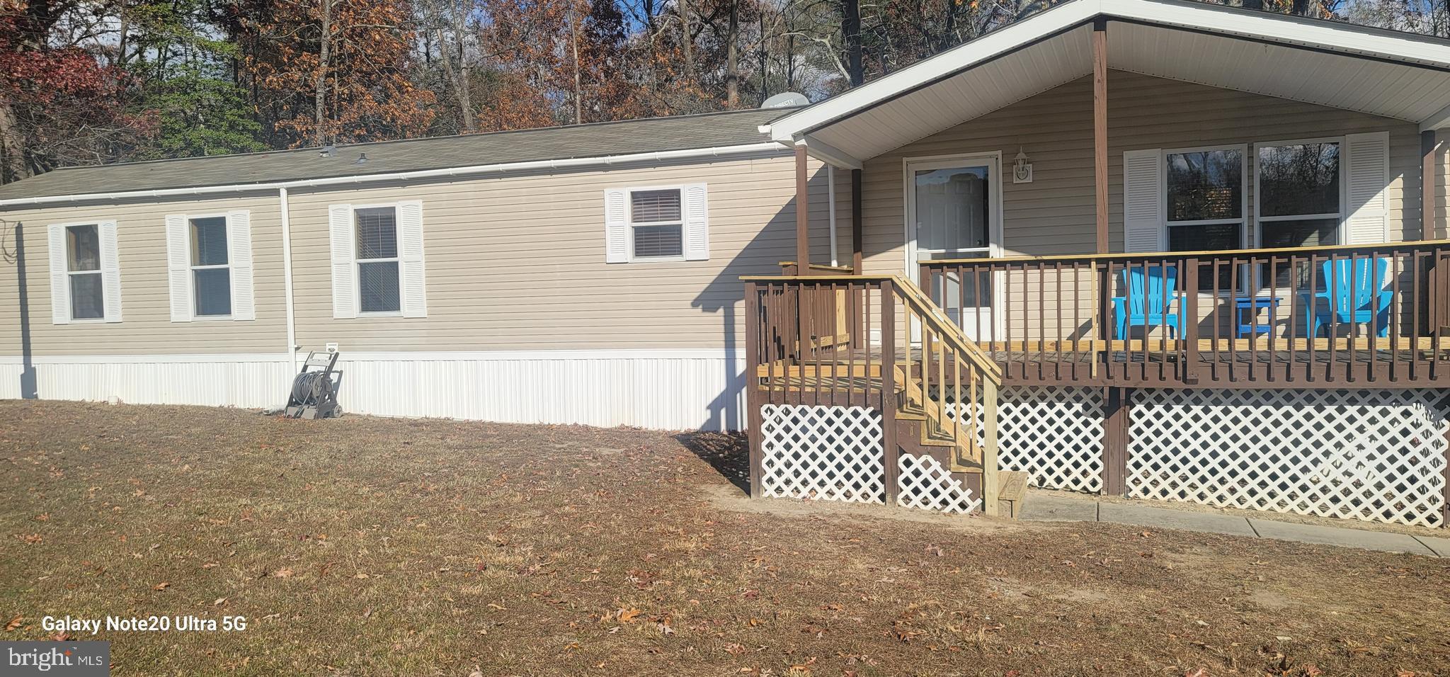 a front view of a house with a fence