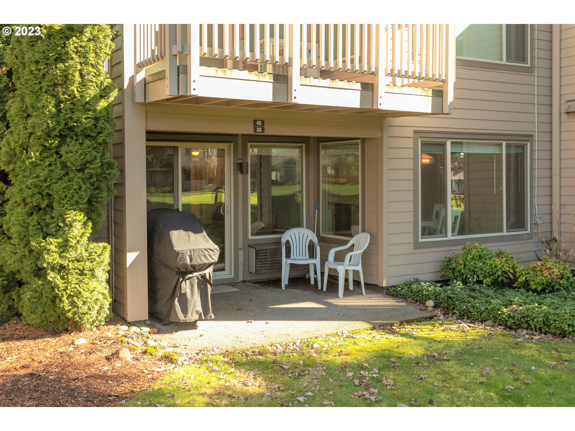 a house view with a seating space and balcony