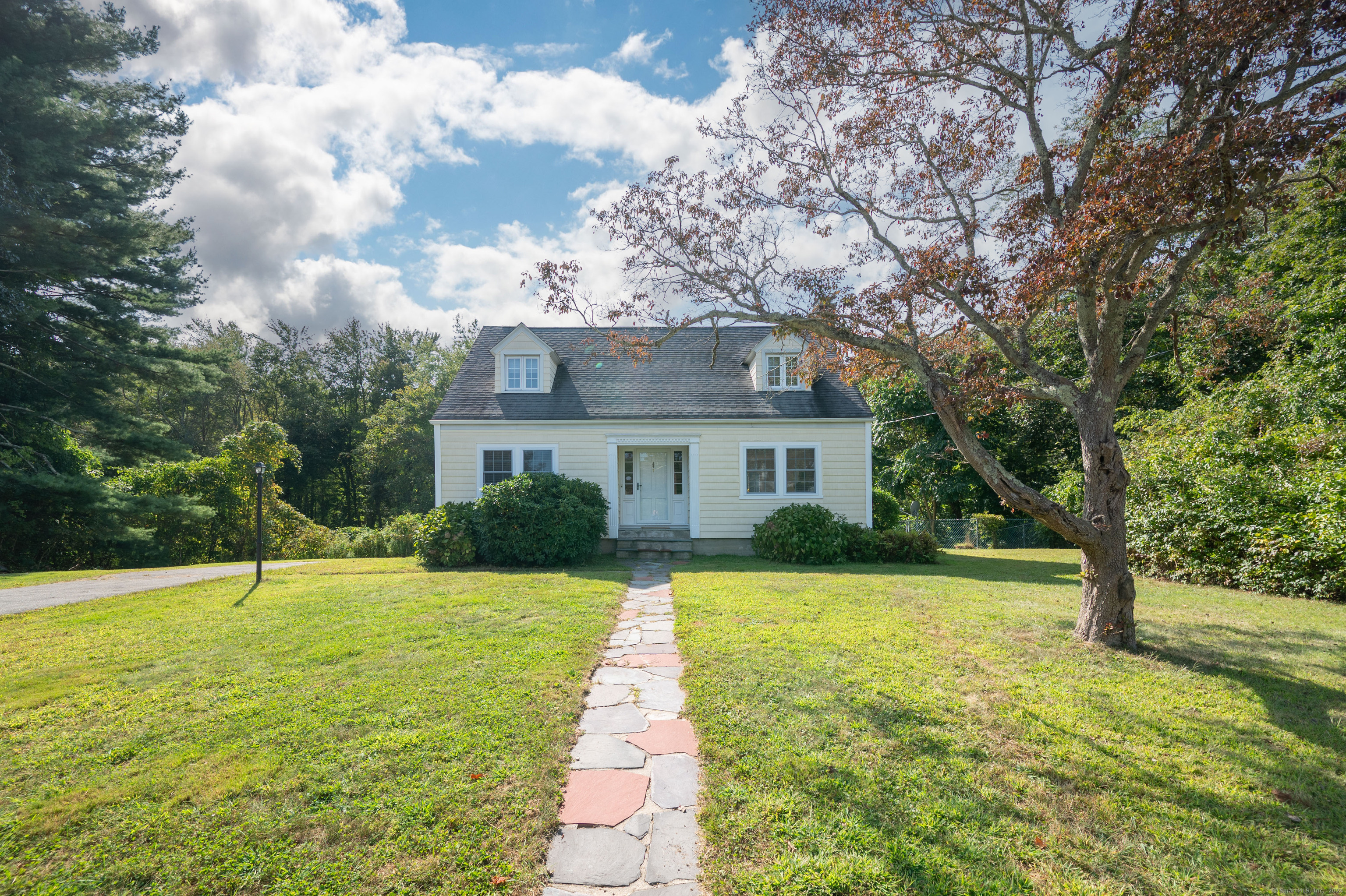 Welcome to this picture perfect Cape Cod home...