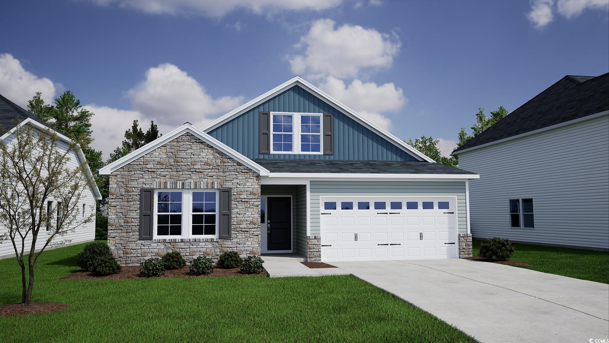 Craftsman inspired home with a front yard