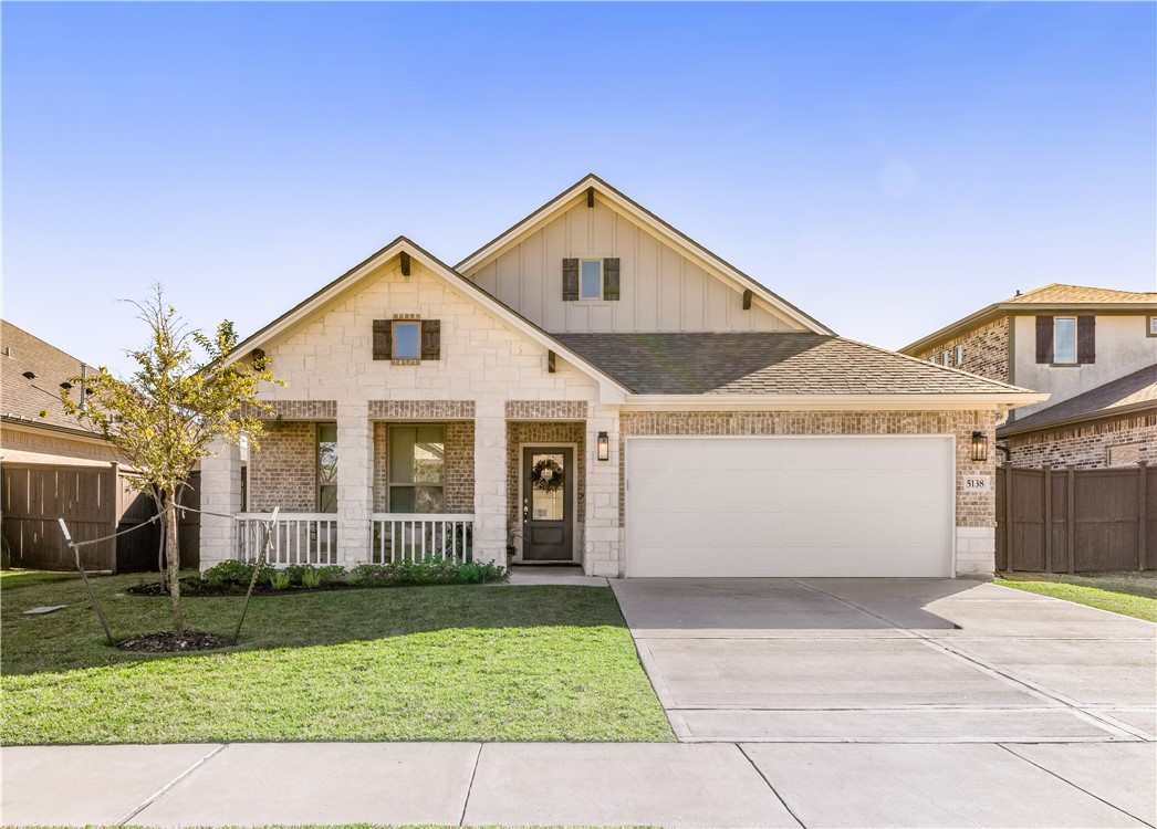 Front view with nice front yard.