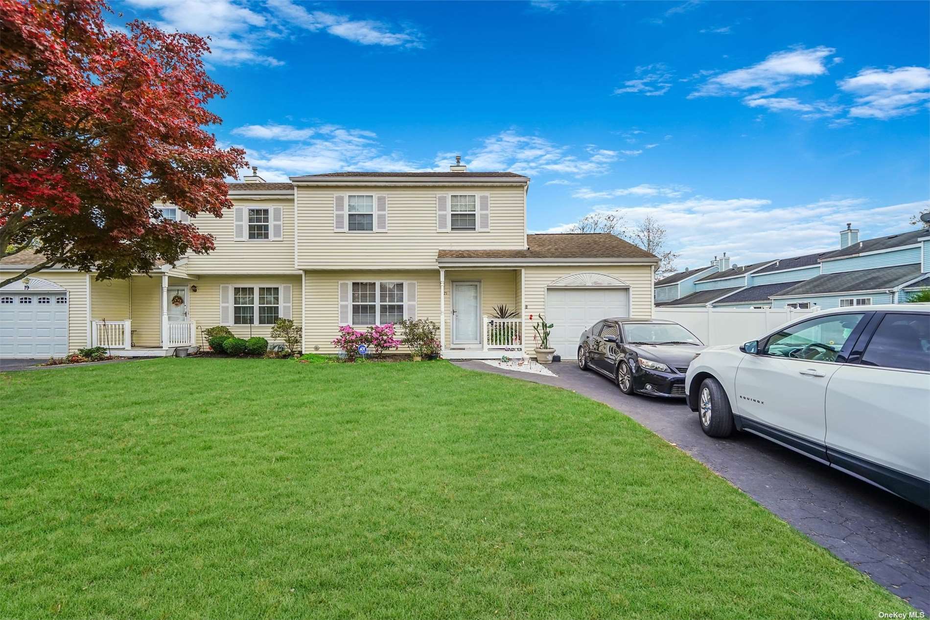 a view of a house with a back yard