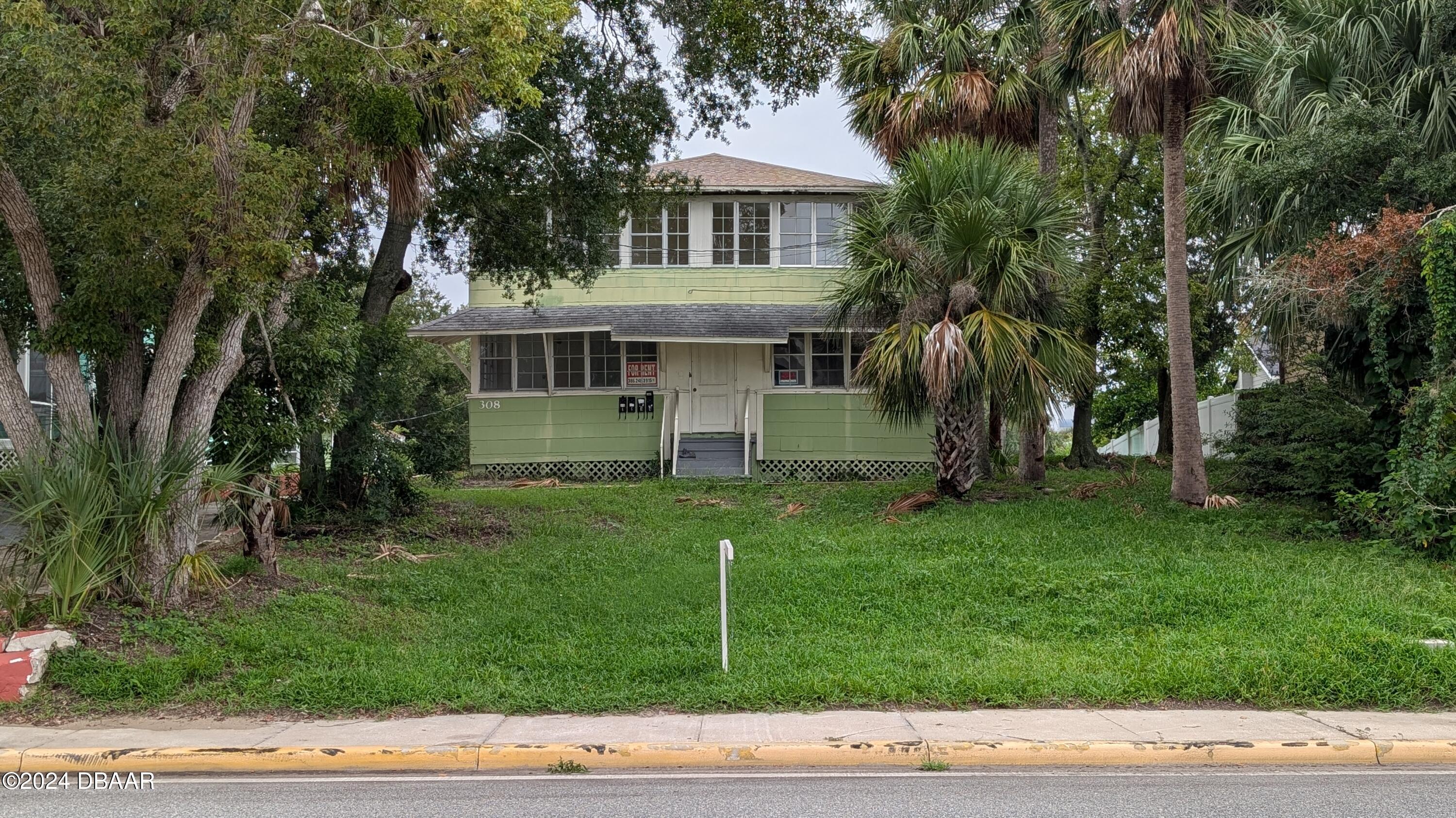 a house view with a garden