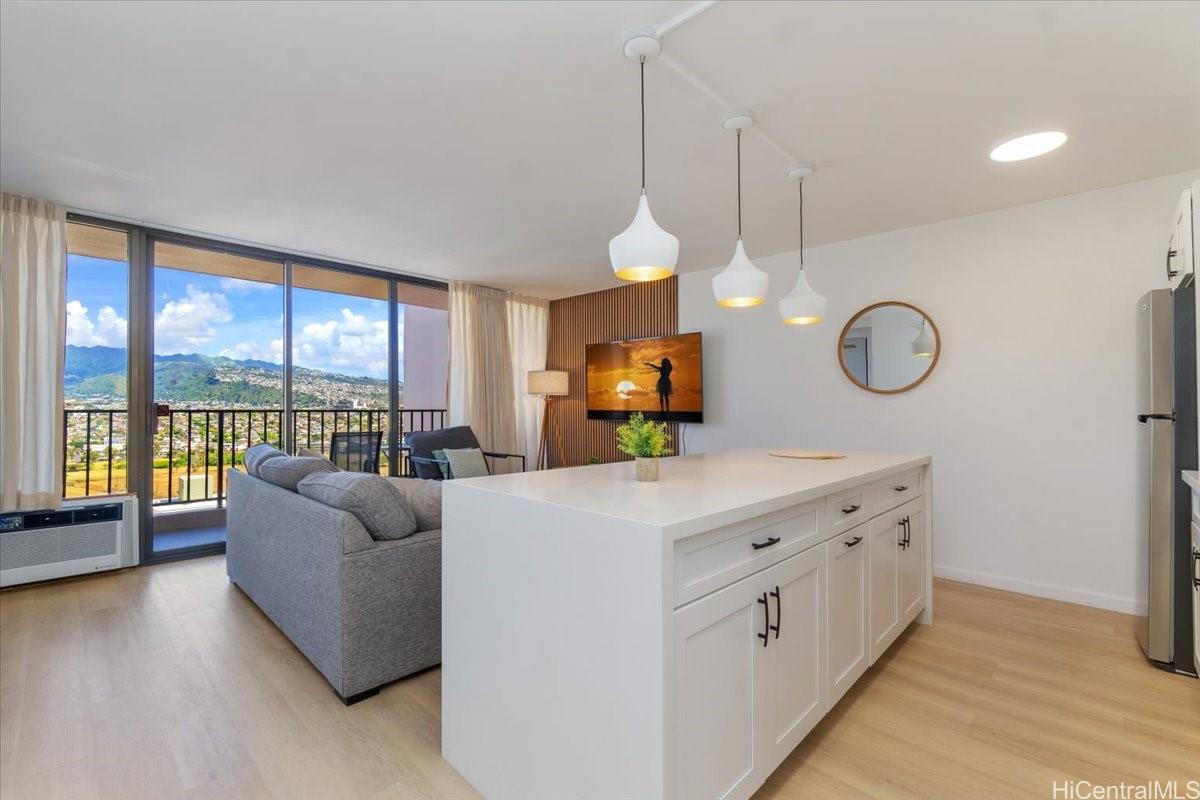 01 Mauka stack is the most private corner-end unit between the two buildings. Fully renovated in 2024. Almost brand new! Great mountain views.