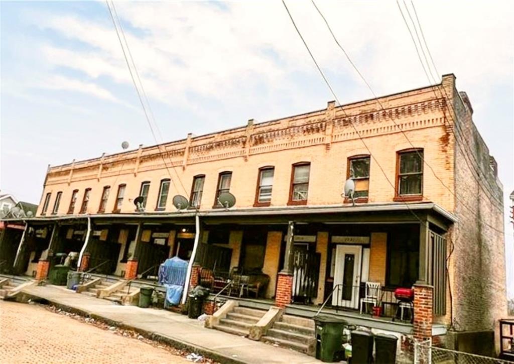 a front view of a building with street