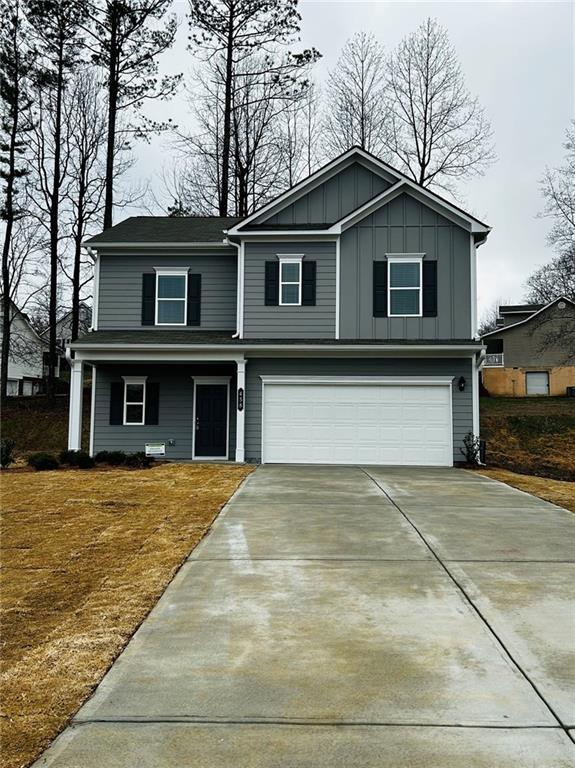 a front view of a house with yard